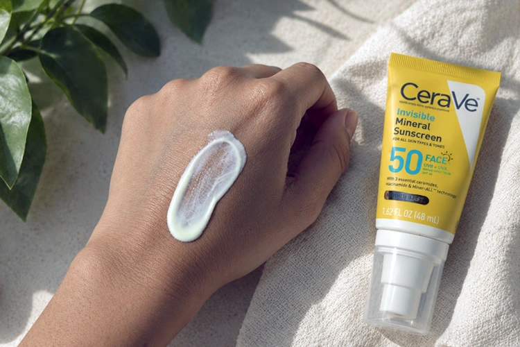 cerave invisible mineral sunscreen swatched on my hand