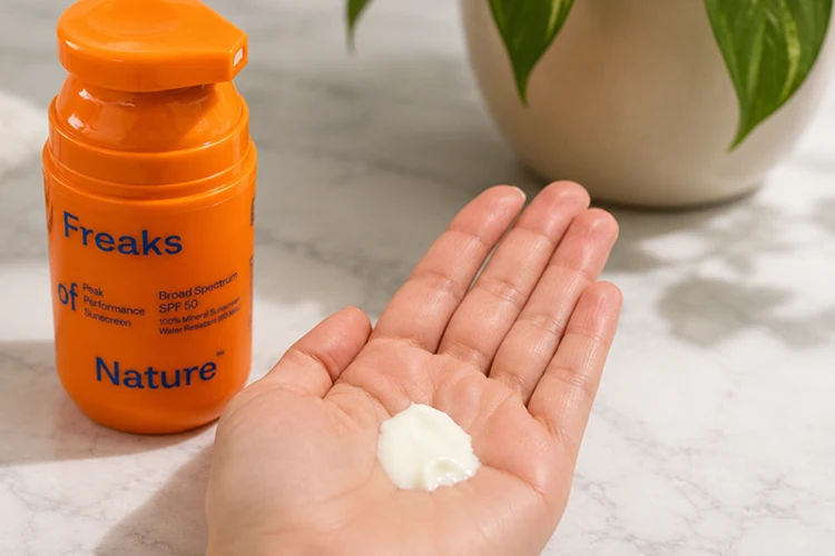 freaks of nature peak performance spf 50 sunscreen swatched on my hand