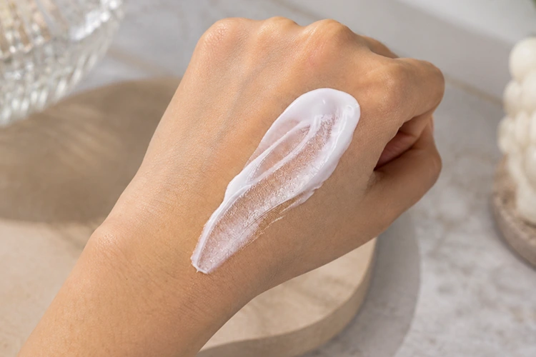 numbuzin no.9 sunscreen squeezed onto my hand